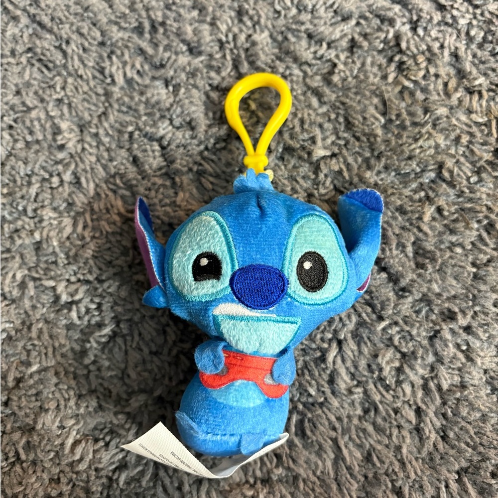 NWT Disney’s stitch playing a video game keychain